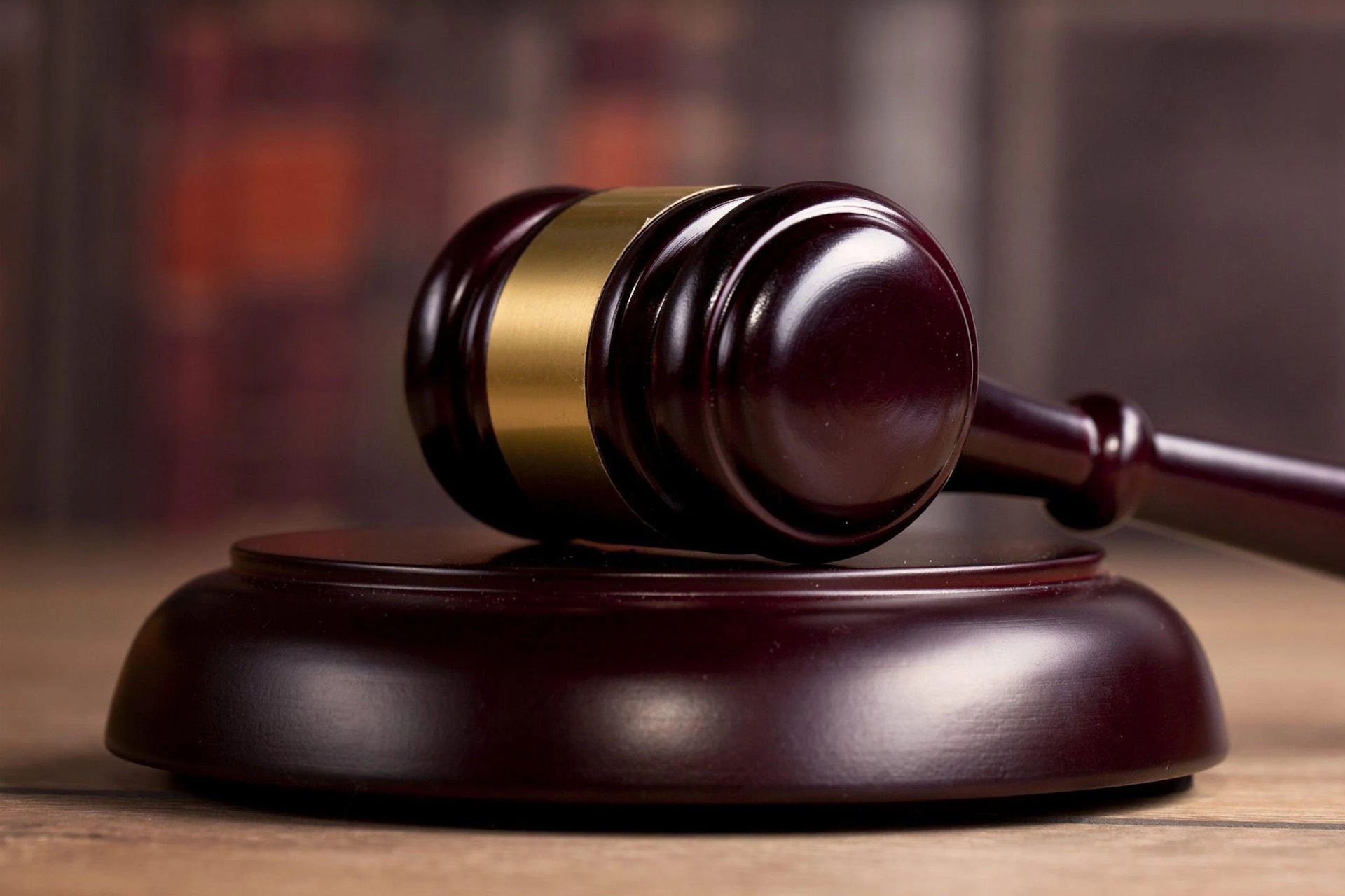 A close up of a gavel in a courtroom