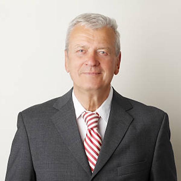 An image of William Johnson, a senior partner